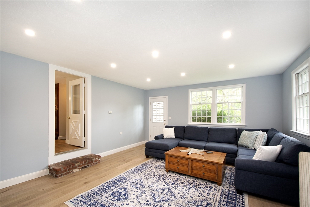 26 Old Coach Road Cohasset, MA 02025 - Photo 10 of 33 a living room with furniture and a window