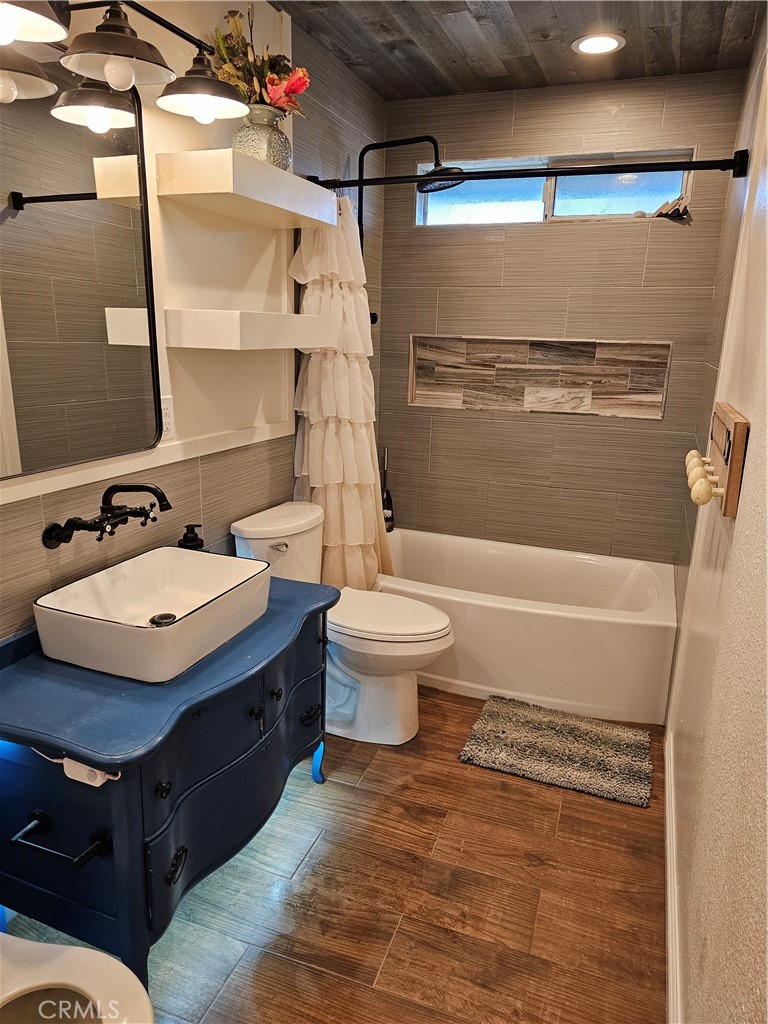 8199 Plane View Place Paso Robles, CA 93446 - Photo 17 of 22 a bathroom with a sink toilet and shower