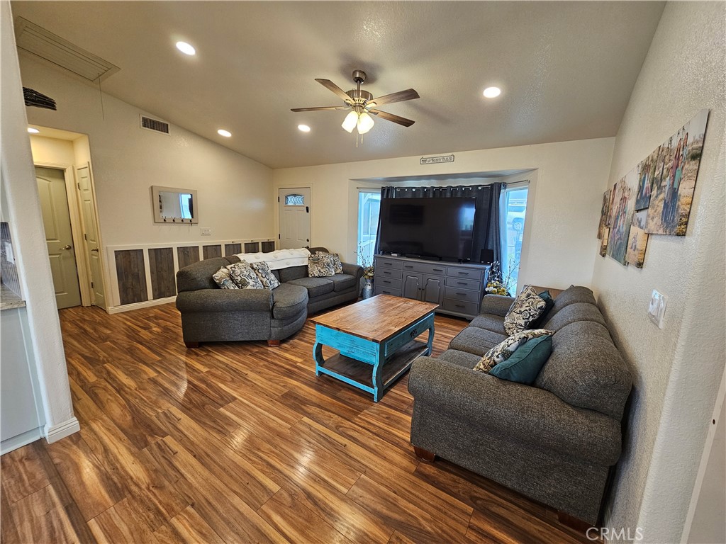 8199 Plane View Place Paso Robles, CA 93446 - Photo 6 of 22 a living room with furniture and a flat screen tv