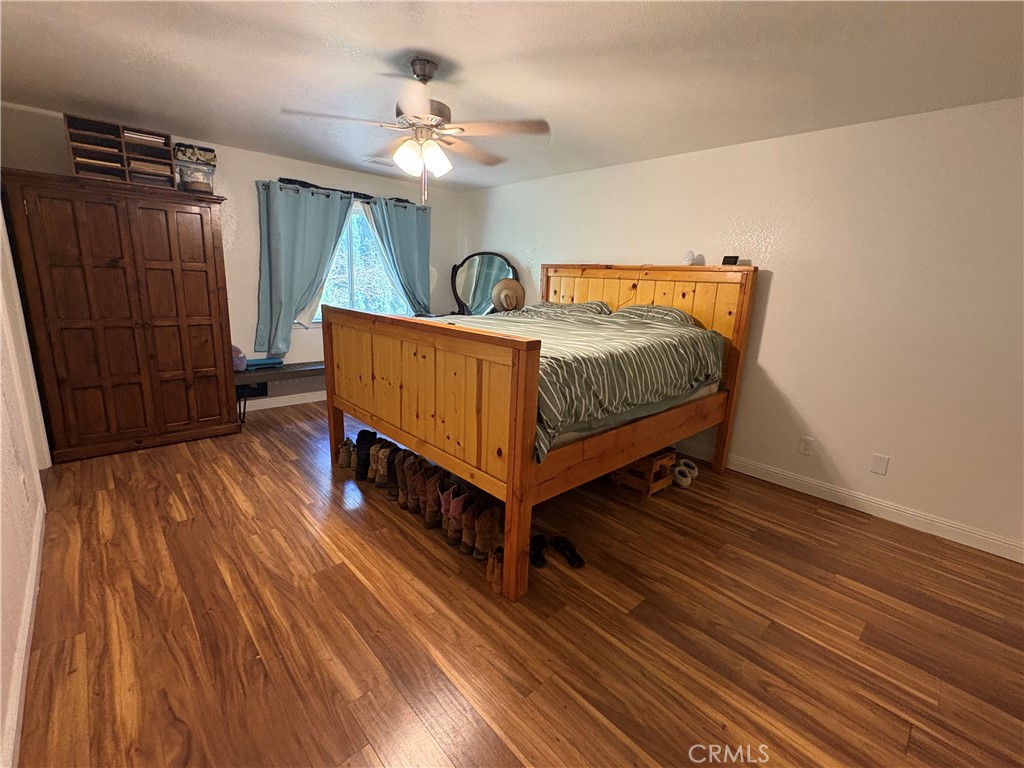 8199 Plane View Place Paso Robles, CA 93446 - Photo 8 of 22 a bedroom with a bed and a mirror