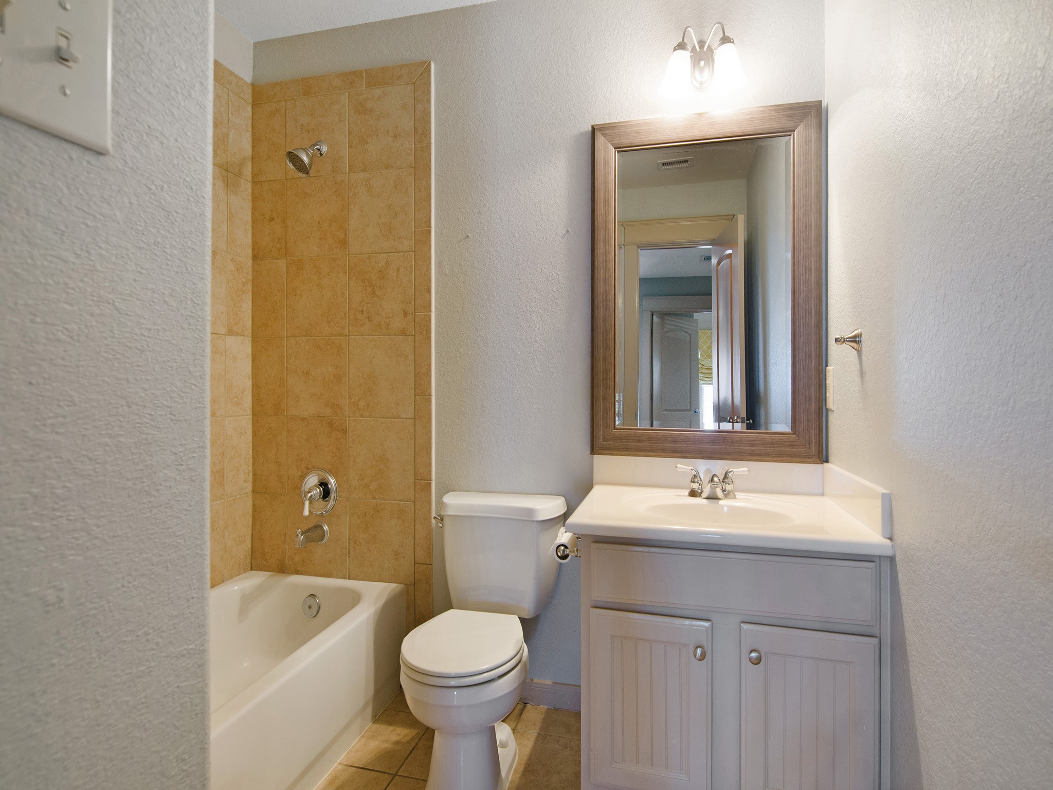 28323 Ryans Ridge Lane Spring, TX 77386 - Photo 31 of 45 Full bath with tub & shower combo, conveniently serving the upstairs bedrooms.