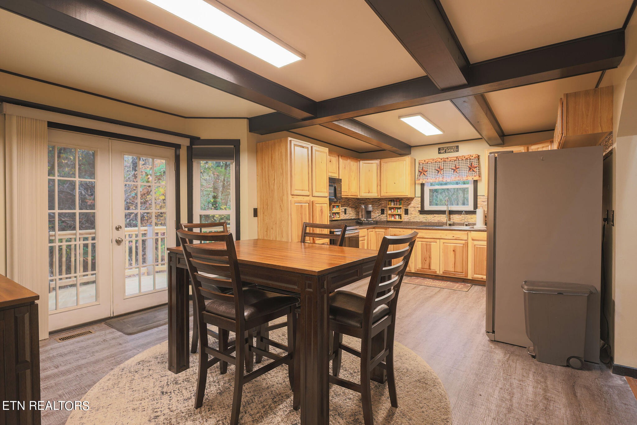 160 Rainbow Lane La Follette, TN 37766 - Photo 11 of 58 a kitchen with a table and chairs in it