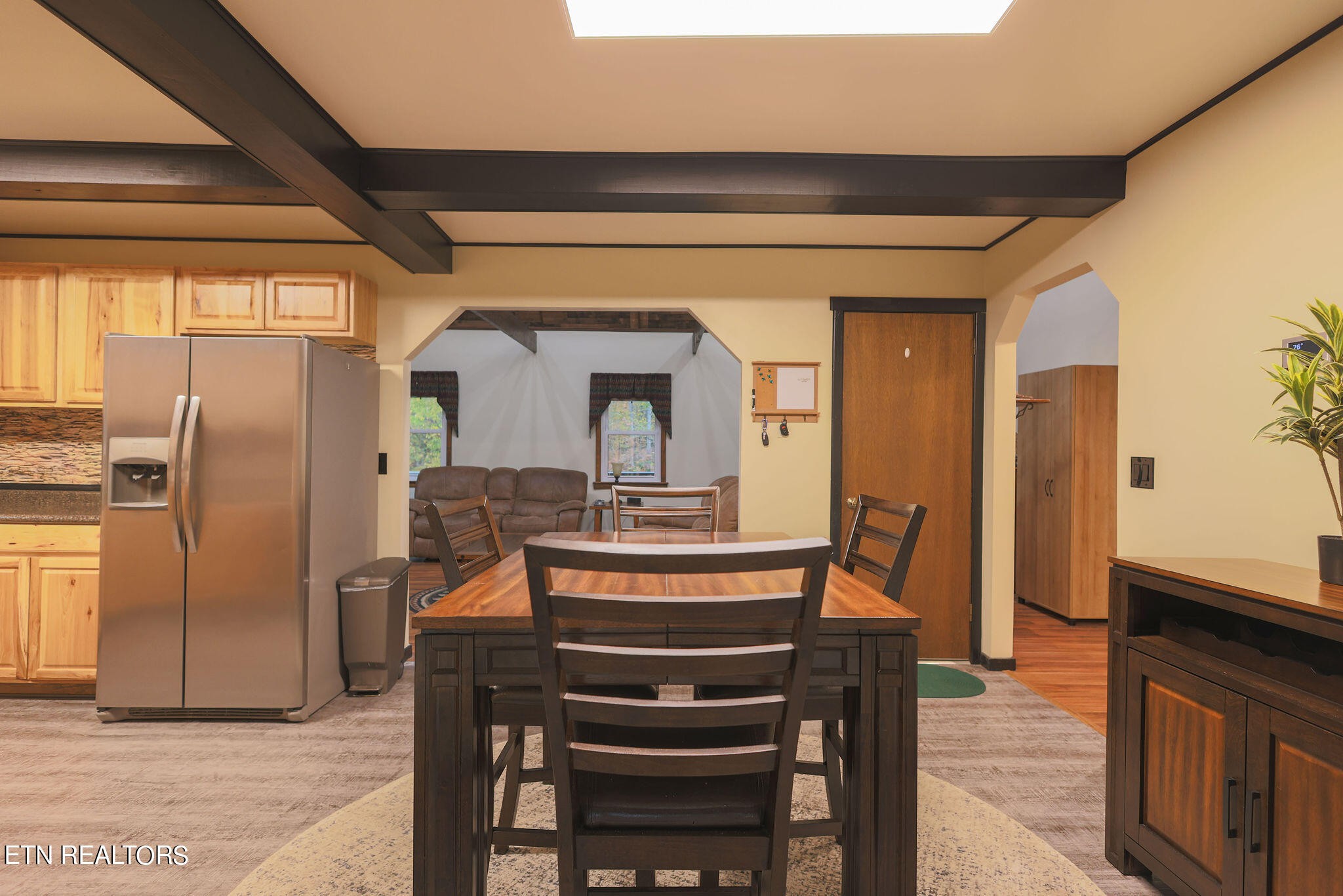 160 Rainbow Lane La Follette, TN 37766 - Photo 13 of 58 a view of a dining room with furniture window and wooden floor