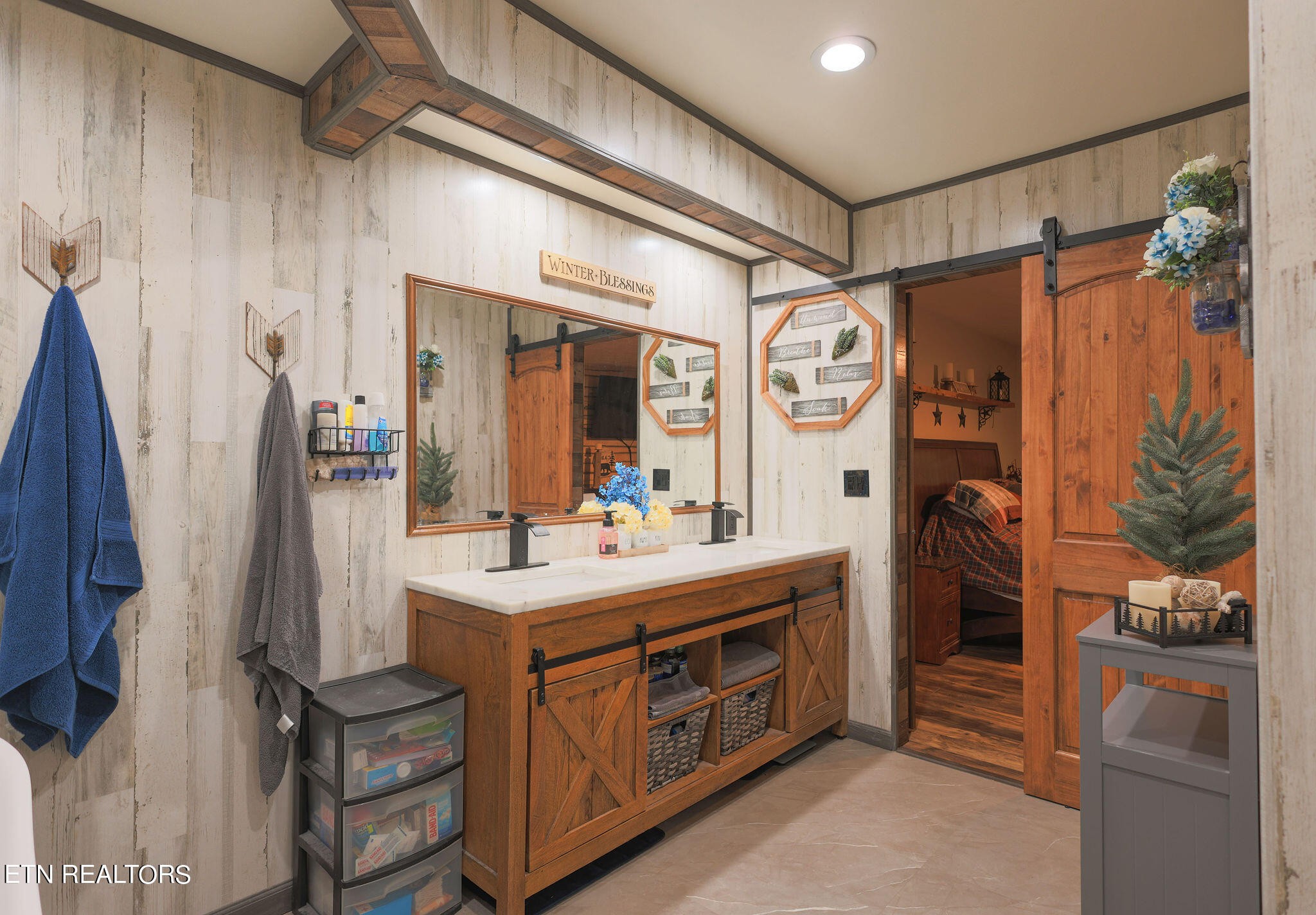 160 Rainbow Lane La Follette, TN 37766 - Photo 23 of 58 a bathroom with a sink a mirror and a shower