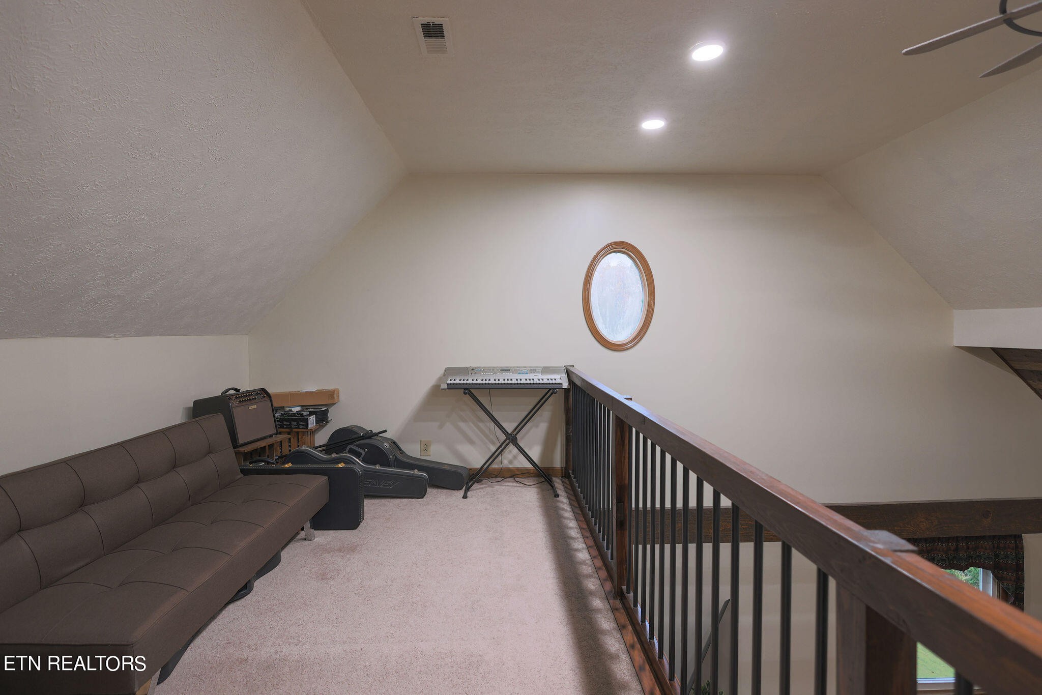 160 Rainbow Lane La Follette, TN 37766 - Photo 27 of 58 a view of a livingroom with furniture and brick wall