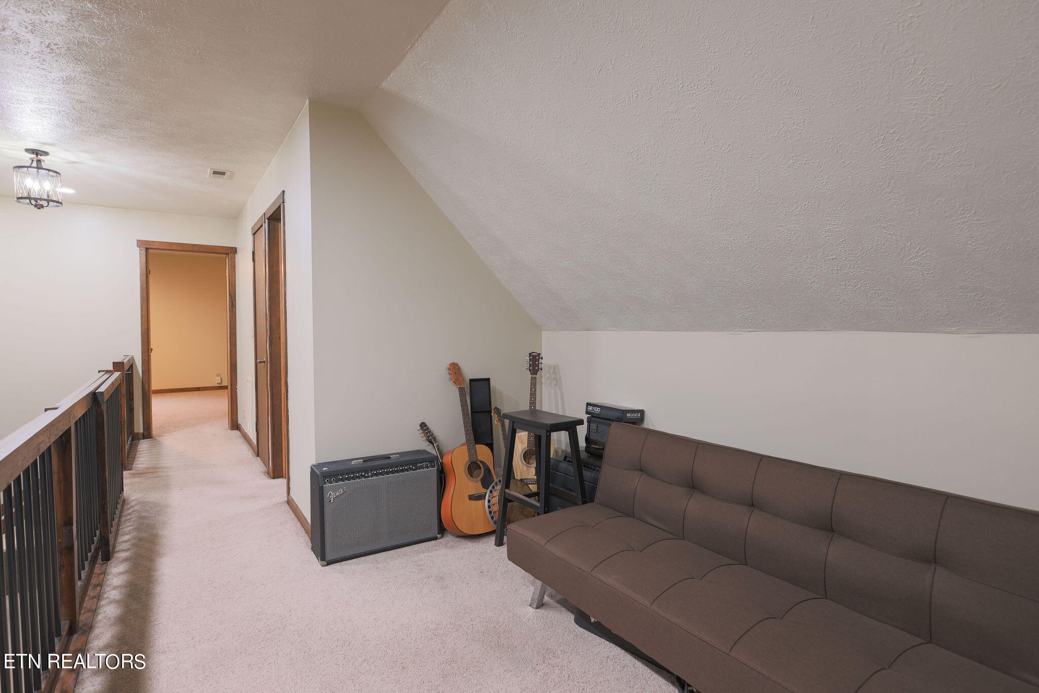 160 Rainbow Lane La Follette, TN 37766 - Photo 29 of 58 a living room with furniture and a projector screen