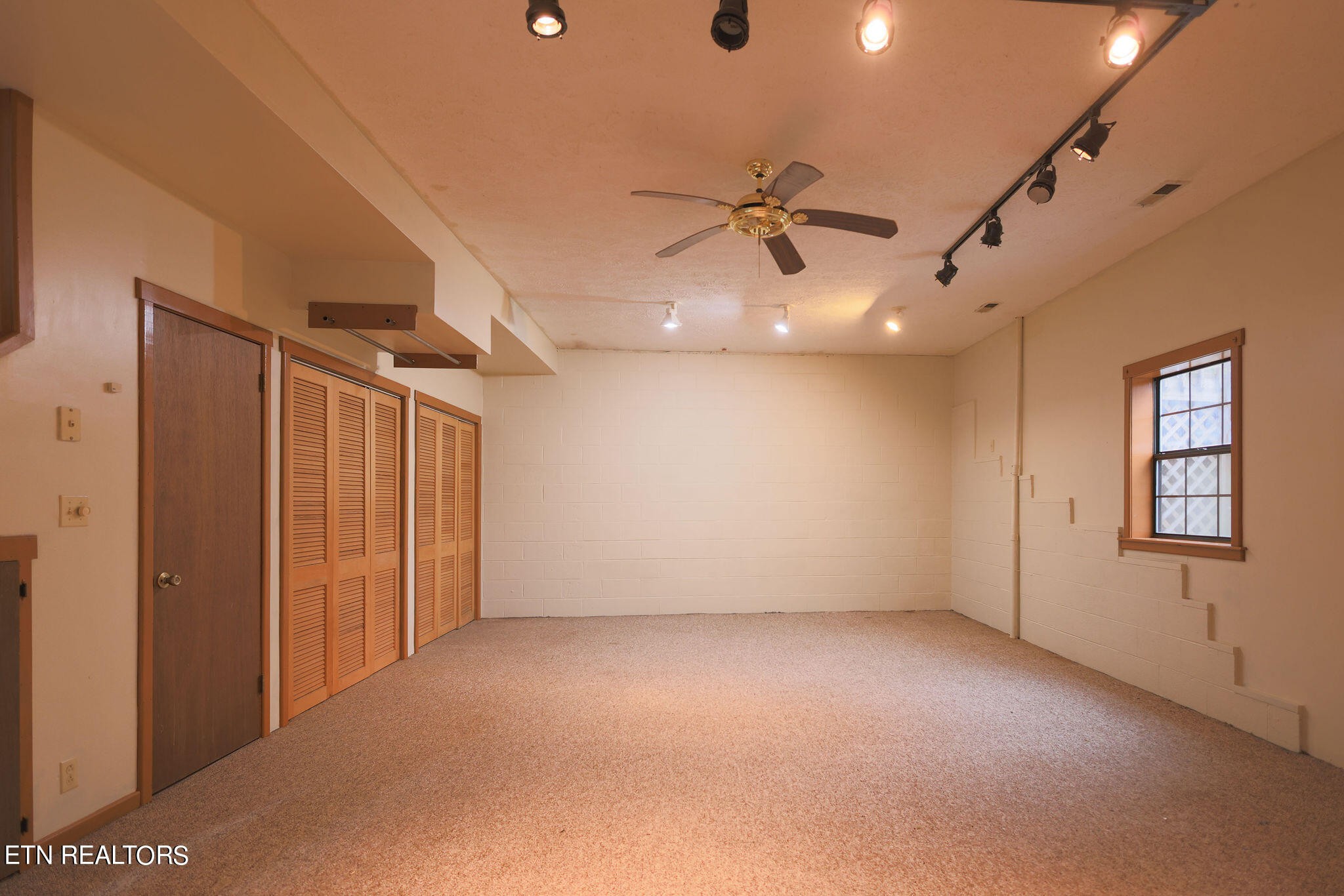 160 Rainbow Lane La Follette, TN 37766 - Photo 48 of 58 an empty room with windows and fan