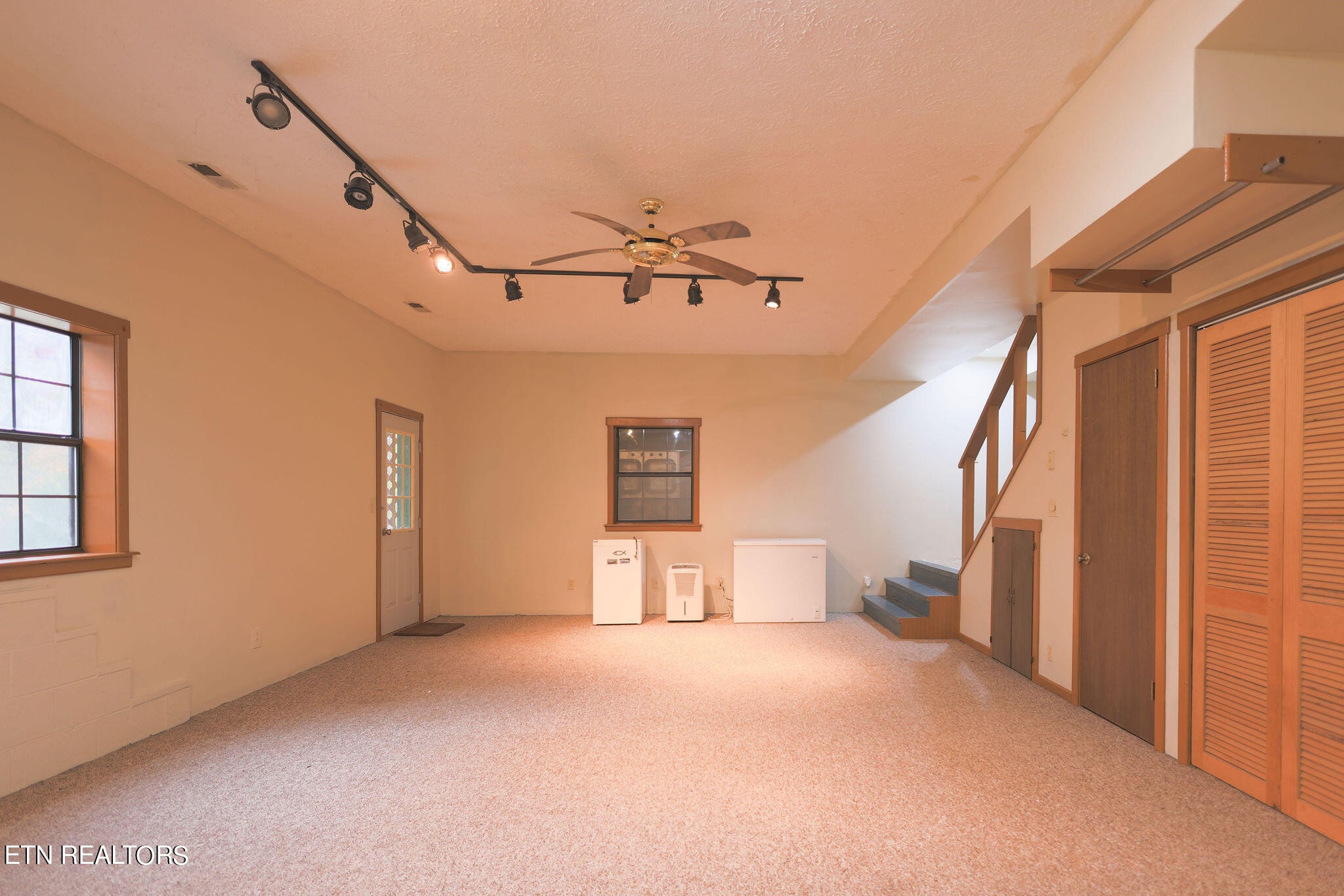 160 Rainbow Lane La Follette, TN 37766 - Photo 50 of 58 a view of a livingroom with a ceiling fan