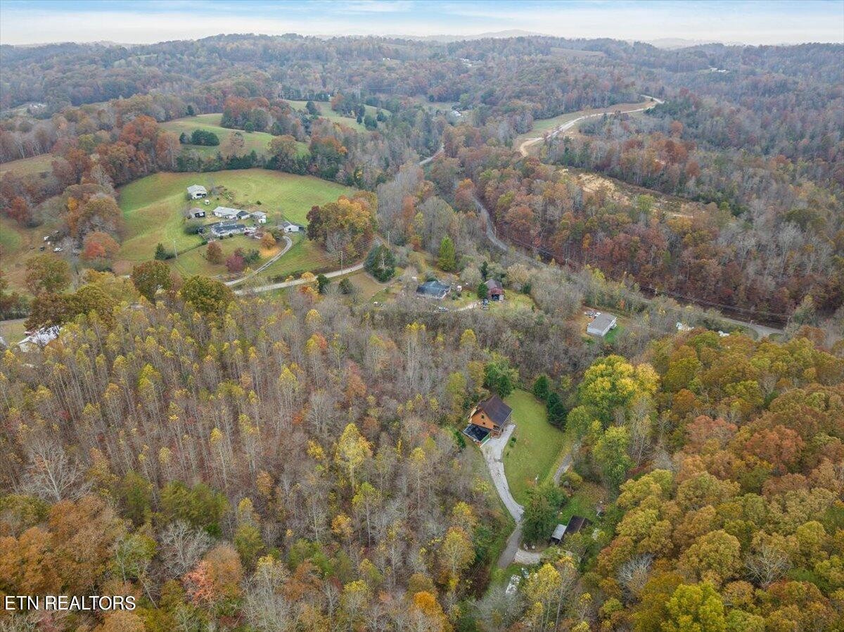 160 Rainbow Lane La Follette, TN 37766 - Photo 57 of 58 a view of a lake with mountains in the background