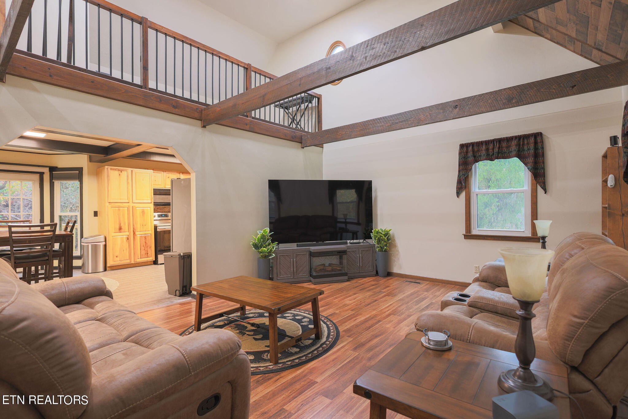 160 Rainbow Lane La Follette, TN 37766 - Photo 6 of 58 a living room with furniture and a flat screen tv