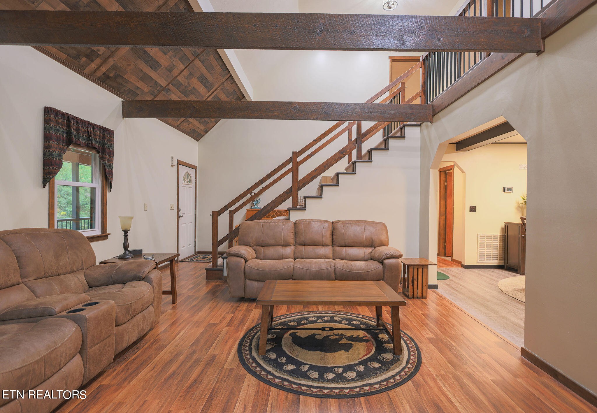160 Rainbow Lane La Follette, TN 37766 - Photo 8 of 58 a living room with furniture and a fireplace