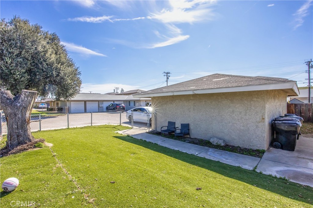 16929 Reed Street Fontana, CA 92336 - Photo 12 of 13 a view of a house with pool and chairs