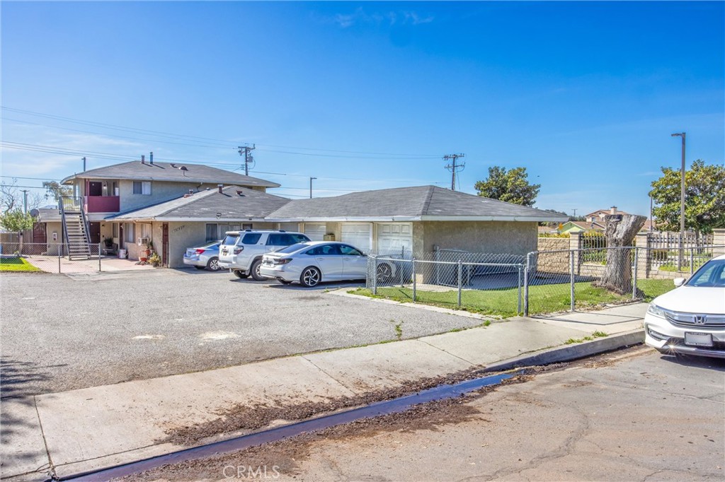 16929 Reed Street Fontana, CA 92336 - Photo 6 of 13 a car parked in front of a building