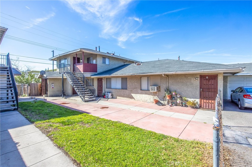 16929 Reed Street Fontana, CA 92336 - Photo 8 of 13 a view of a house with backyard porch and sitting area