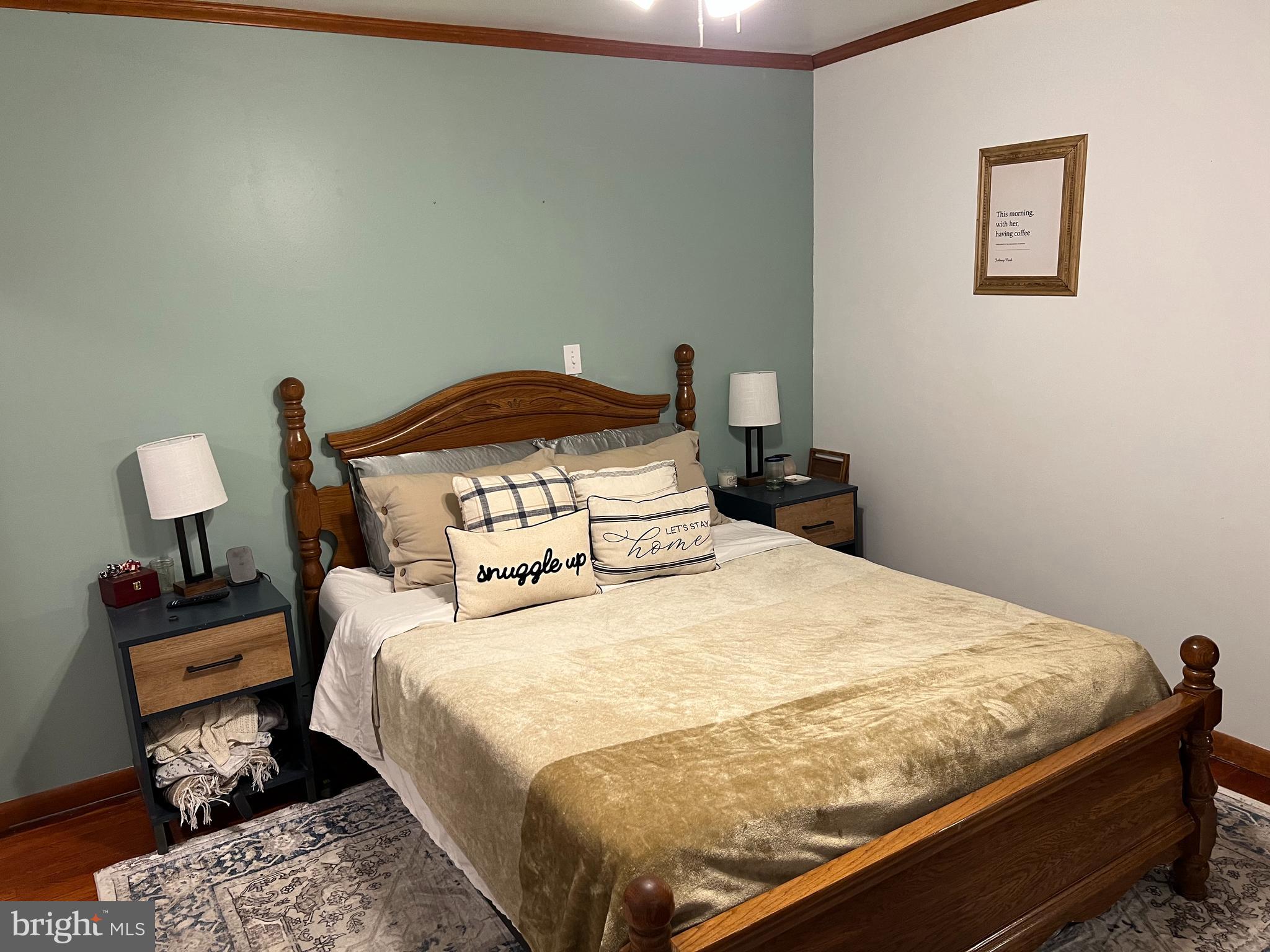 32 Paradise Road Aberdeen, MD 21001 - Photo 16 of 27 a bedroom with a bed and a lamp on dresser