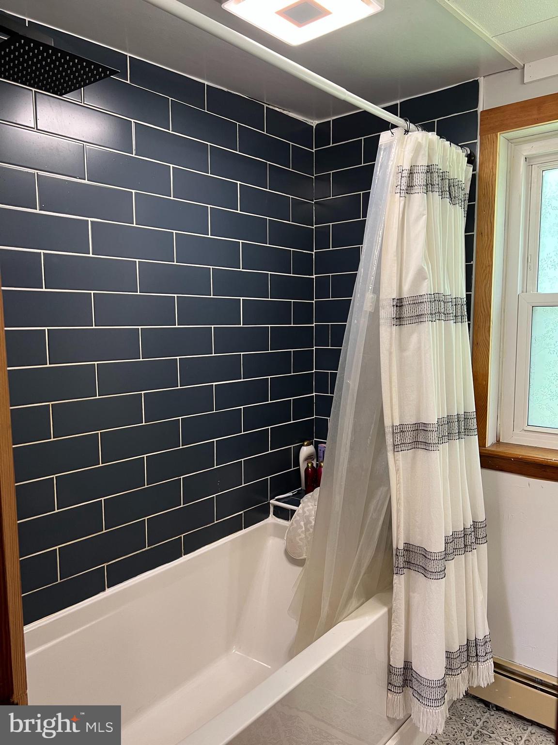 32 Paradise Road Aberdeen, MD 21001 - Photo 18 of 27 a view of a bathroom with a tub and window