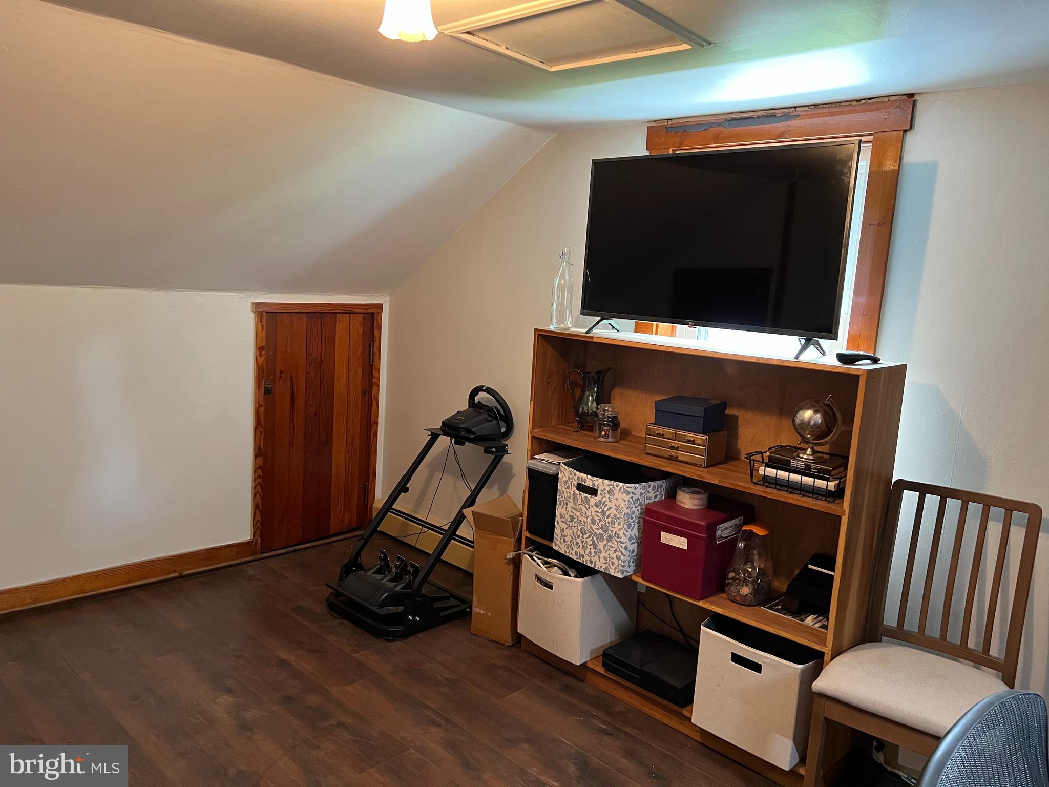 32 Paradise Road Aberdeen, MD 21001 - Photo 21 of 27 a room with wooden floor and gym equipment