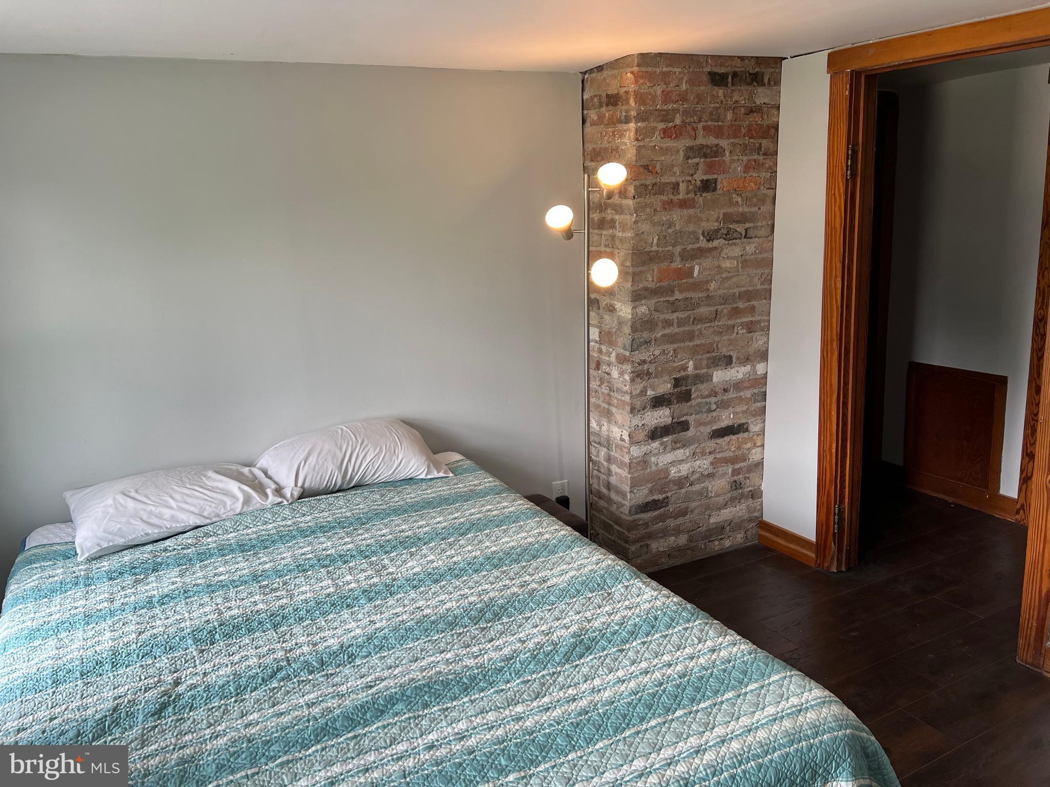 32 Paradise Road Aberdeen, MD 21001 - Photo 25 of 27 a bedroom with a bed and a walk in closet