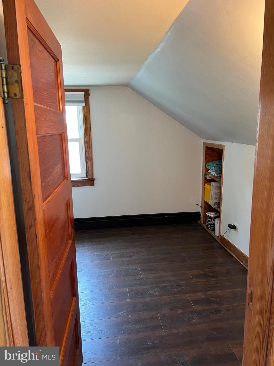 32 Paradise Road Aberdeen, MD 21001 - Photo 26 of 27 a view of an empty room with wooden floor and a window
