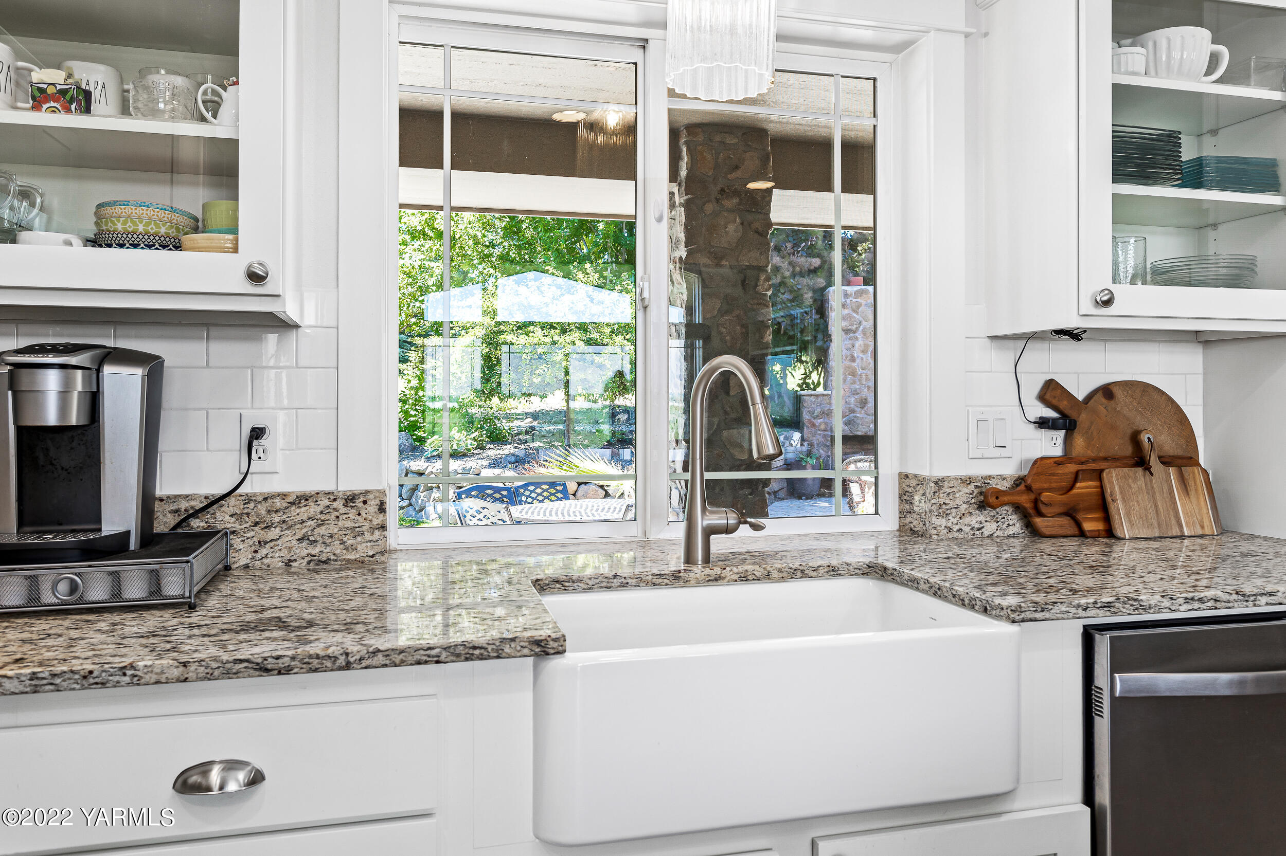 190 Nash Road Tieton, WA 98947 - Photo 16 of 38 a kitchen with granite countertop a sink and a window