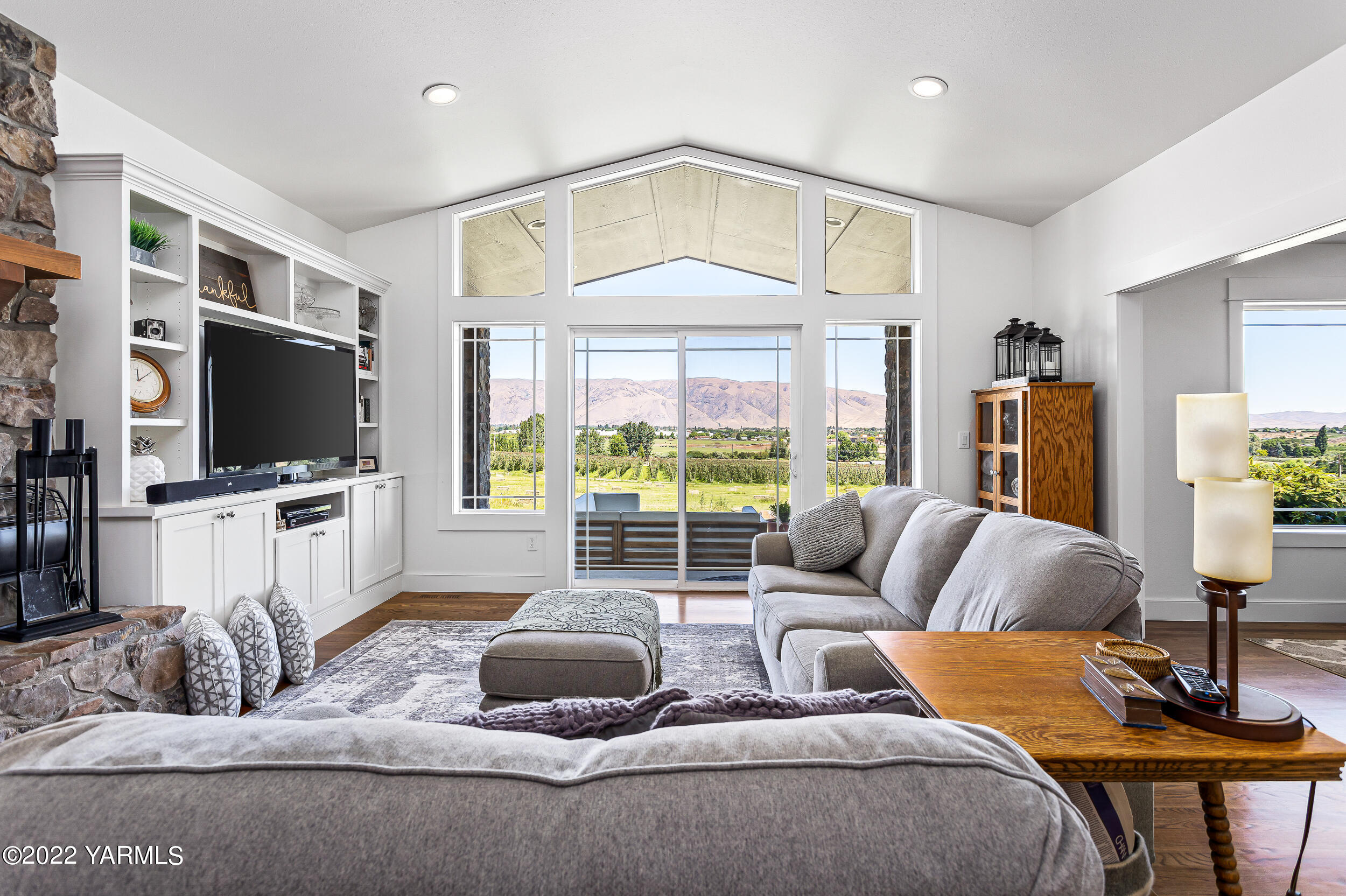 190 Nash Road Tieton, WA 98947 - Photo 17 of 38 a living room with furniture and a flat screen tv