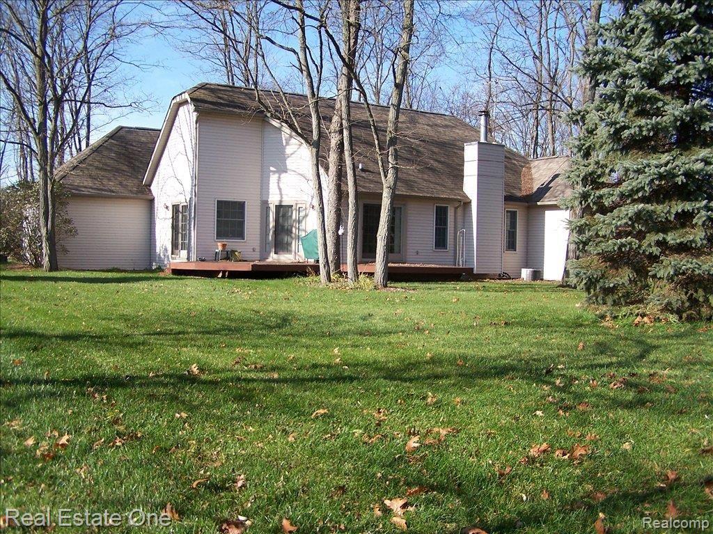 11055 Tree Line Drive Pinckney, MI 48169 - Photo 2 of 25 back view