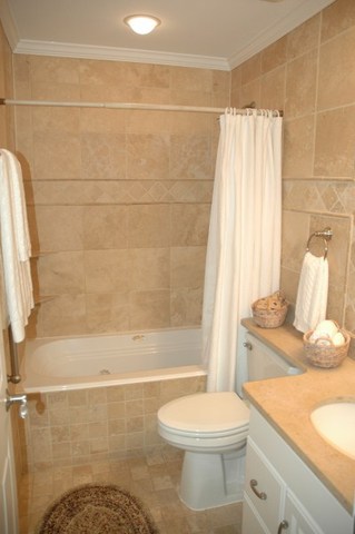 2138 Stirrup Lane Wheaton, IL 60189 - Photo 12 of 16 a bathroom with a toilet and a shower