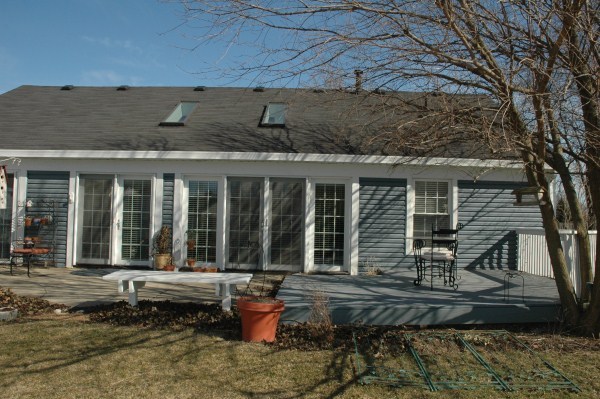 2138 Stirrup Lane Wheaton, IL 60189 - Photo 14 of 16 a front view of a house with porch