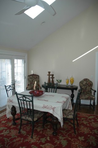 2138 Stirrup Lane Wheaton, IL 60189 - Photo 5 of 16 a view of a dining room with furniture