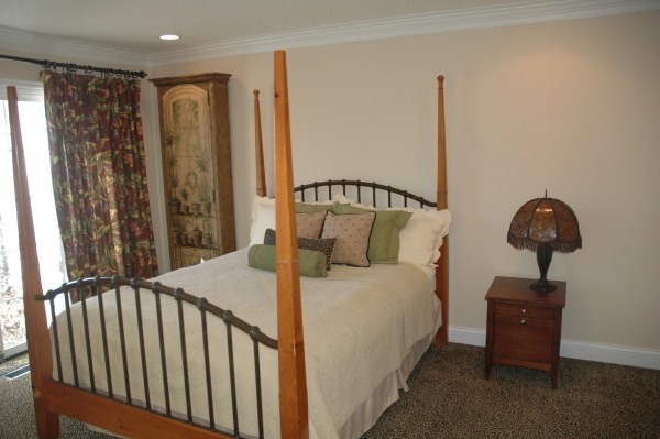 2138 Stirrup Lane Wheaton, IL 60189 - Photo 7 of 16 a bed room with a bed and a chandelier