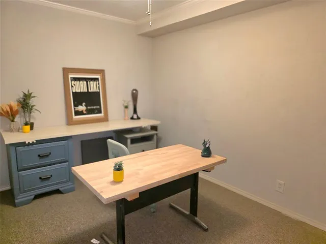 a view of a room with table and chair