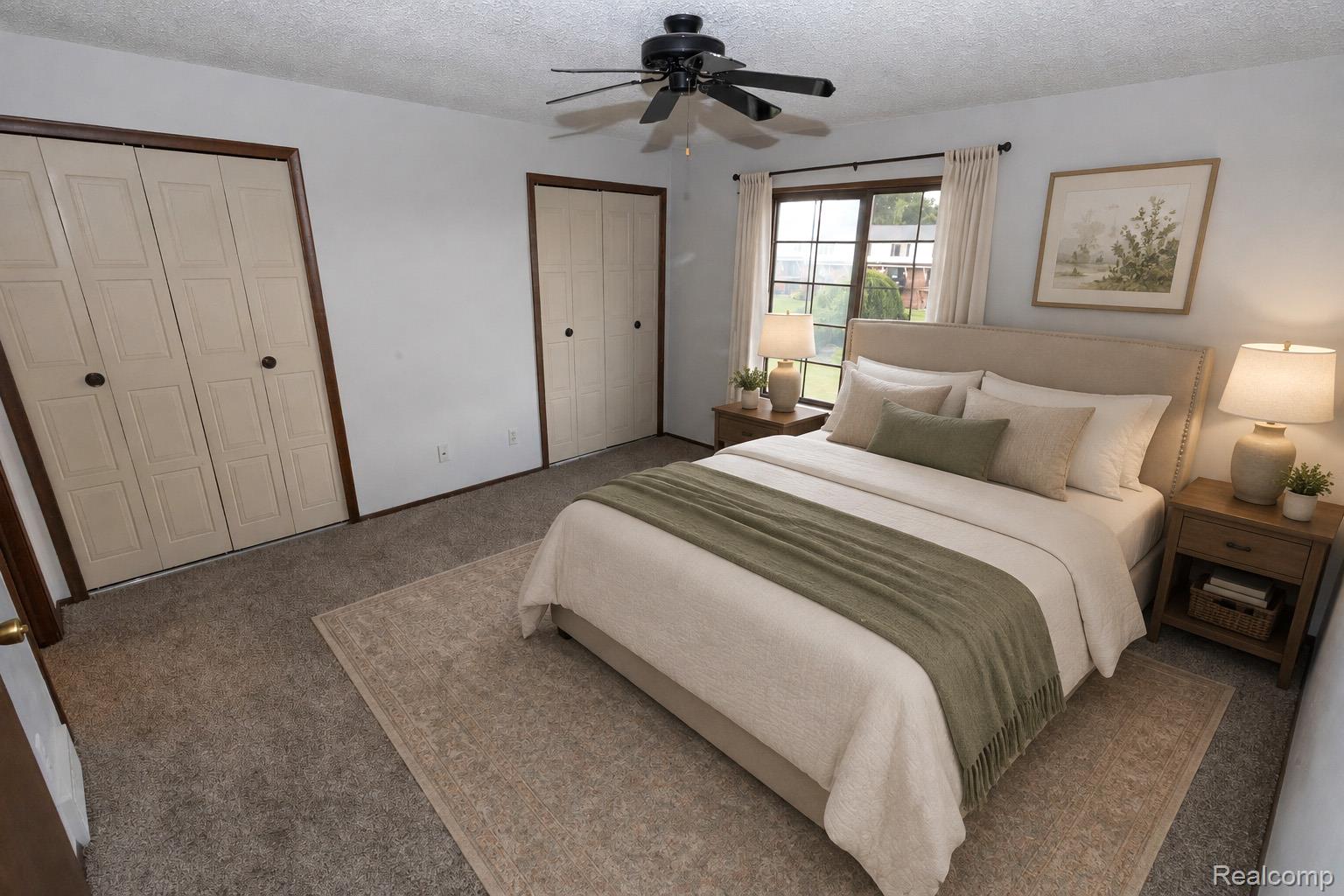 125 Cuttle Road Marysville, MI 48040 - Photo 23 of 44 Wall-to-wall carpeting and a ceiling fan with integrated lighting