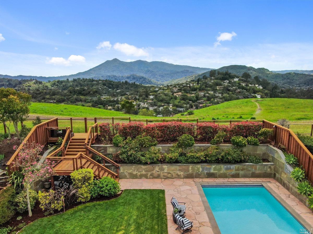 159 Ridgewood Drive San Rafael, CA 94901 - Photo 1 of 1 an aerial view of a house with a garden and lake view