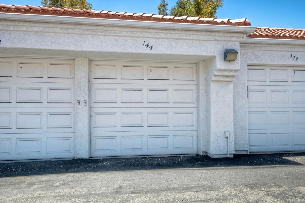 3375 Genoa Way, Unit 144 Oceanside, CA 92056 - Photo 32 of 34 There are storage shelves at the rear of the garage for your large items. There is a remote as well.
