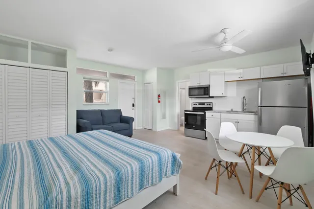 a bedroom with a bed and furniture