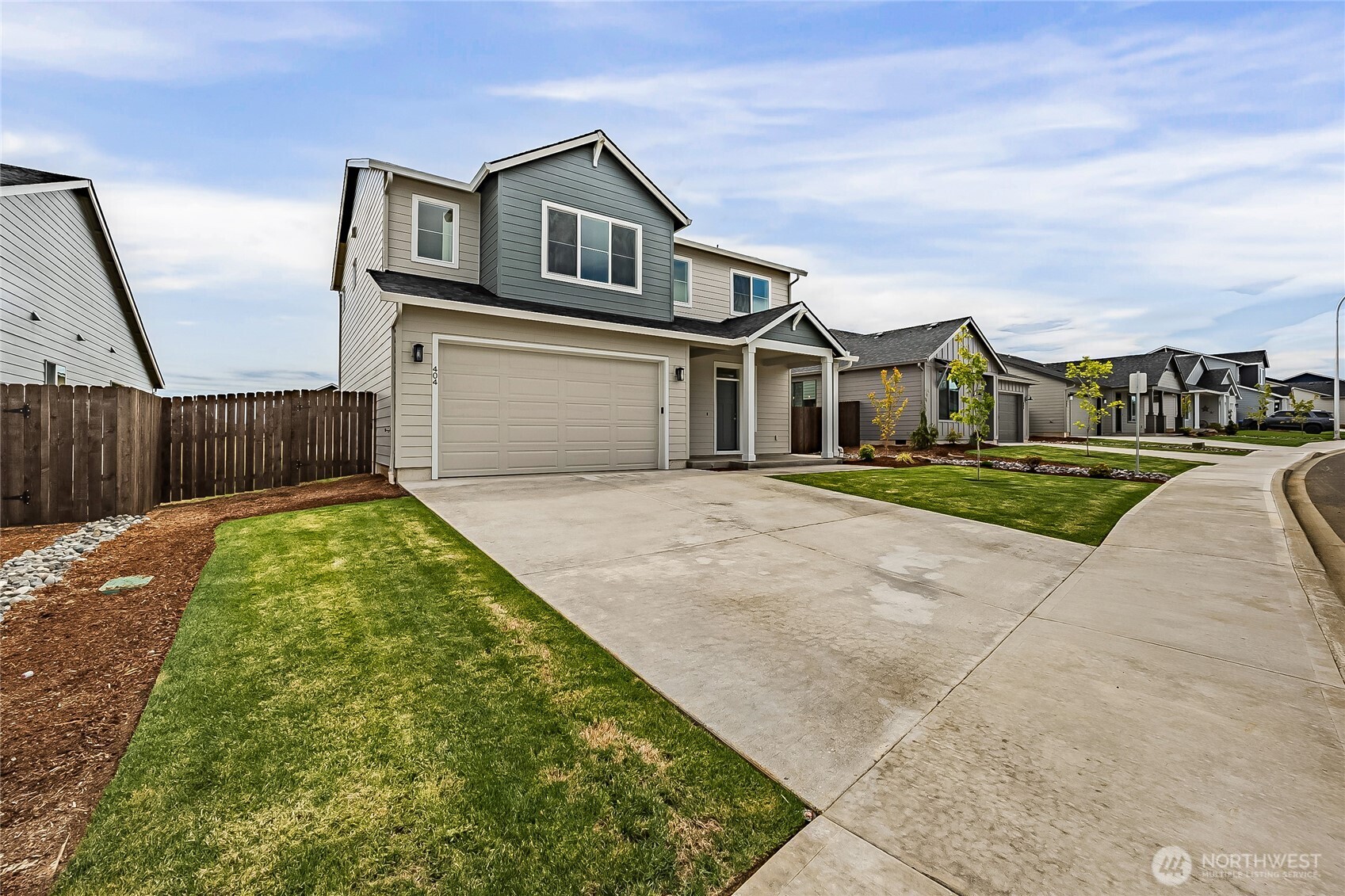 404 Pagget Avenue Winlock, WA 98596 - Photo 2 of 40 a front view of a house with a yard