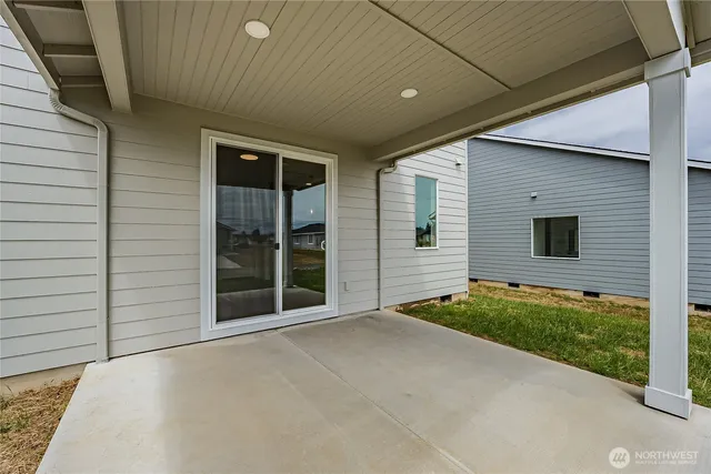 a view of a backyard of the house