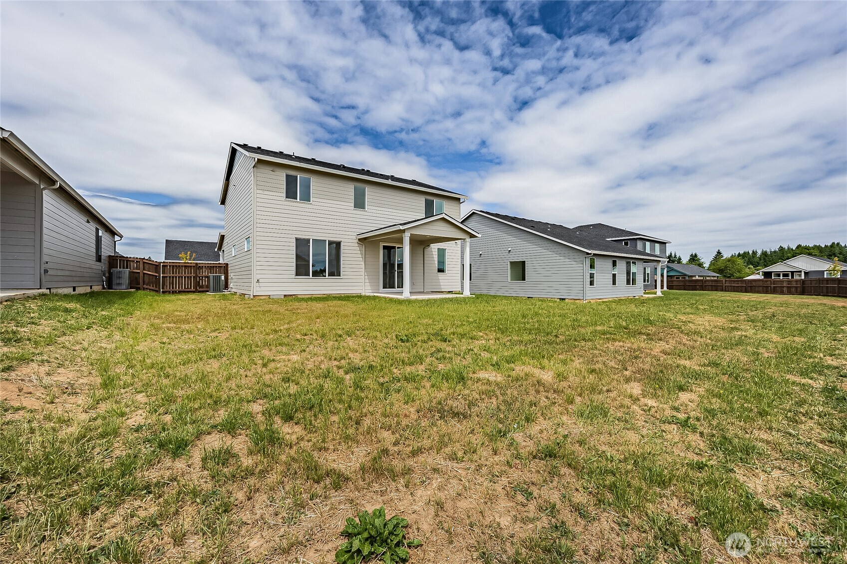 404 Pagget Avenue Winlock, WA 98596 - Photo 37 of 40 a house view with swimming pool in front of it