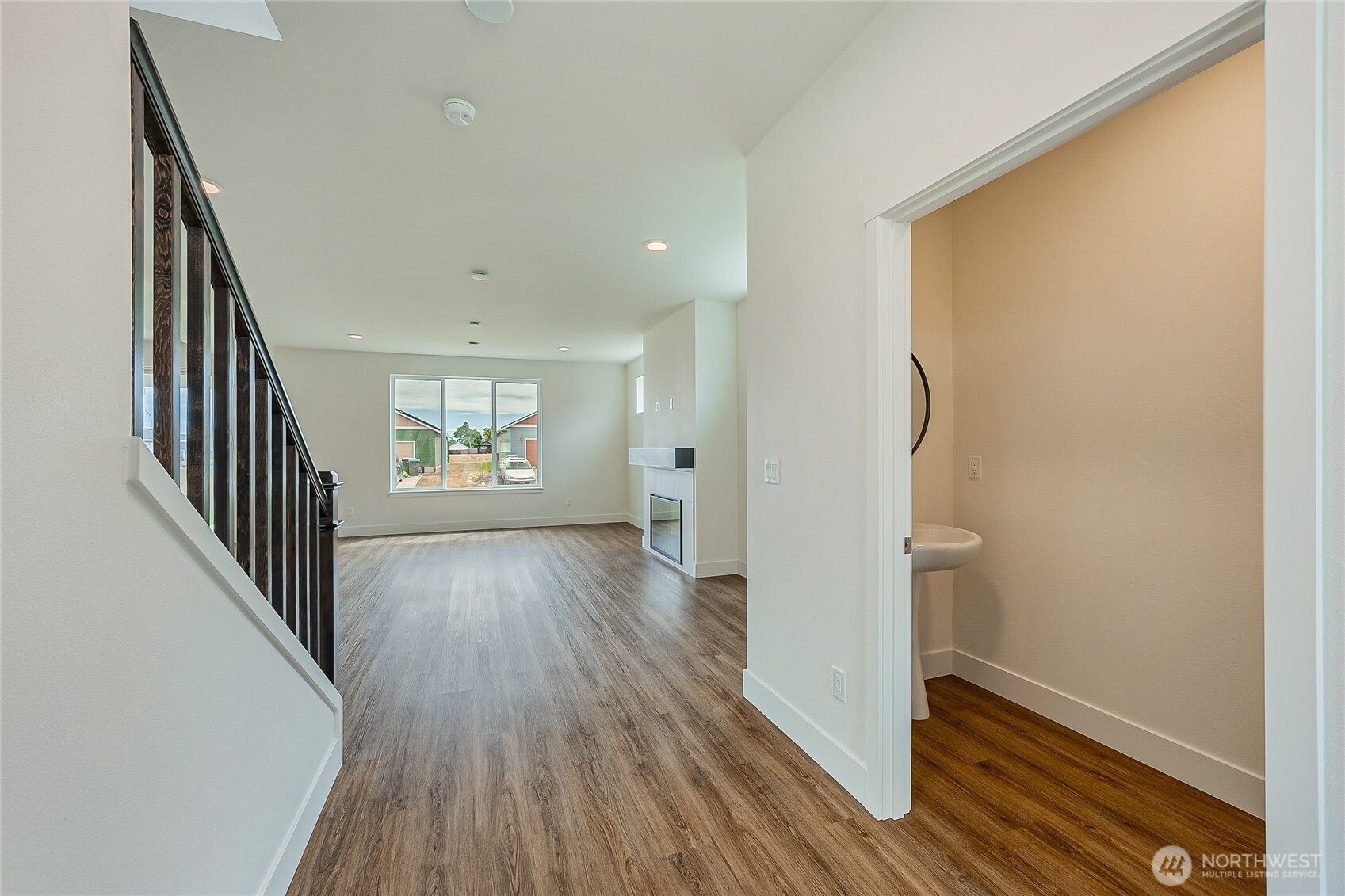 404 Pagget Avenue Winlock, WA 98596 - Photo 5 of 40 wooden floor in an empty room with a window