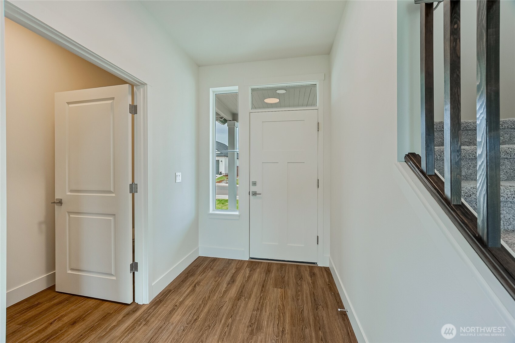 404 Pagget Avenue Winlock, WA 98596 - Photo 6 of 40 a view of a hallway with wooden floor