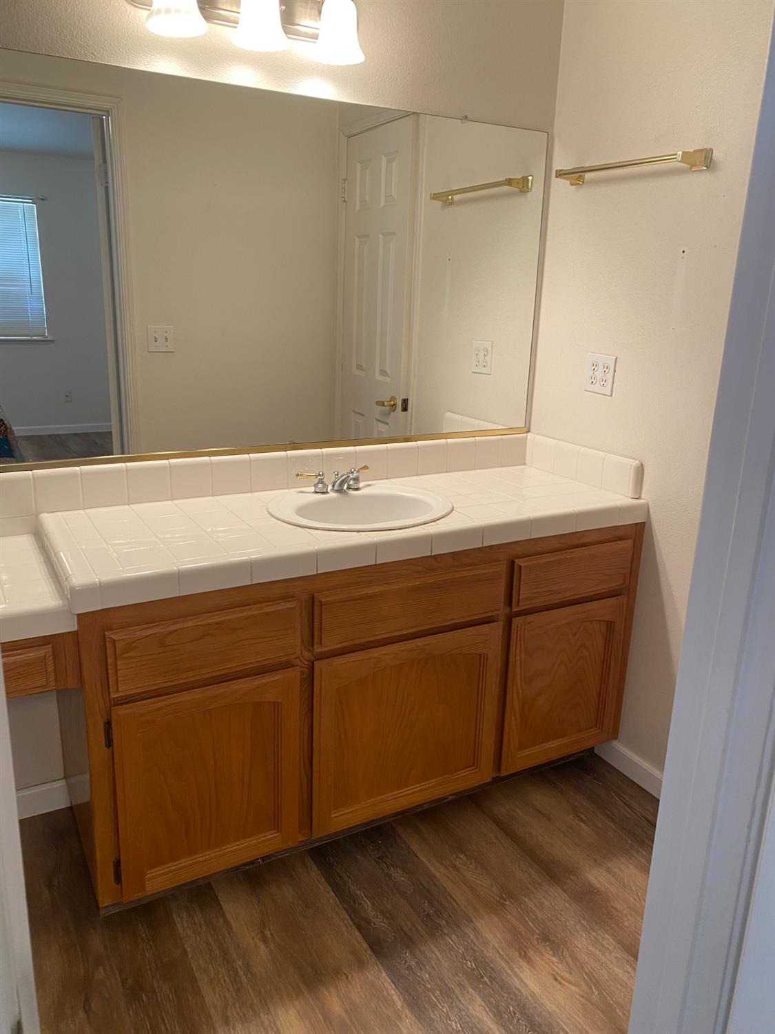 609 Merlot Avenue Madera, CA 93637 - Photo 21 of 45 a room with a sink cabinets and utility room