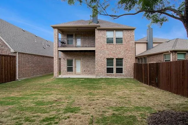 a view of a balcony with wooden floor