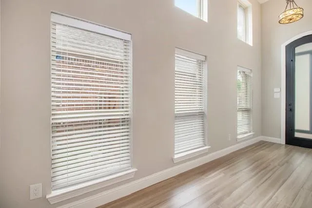 a view of a room that has a window in it