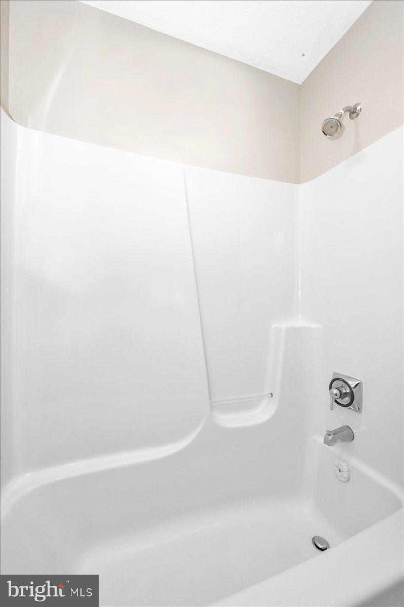 1184 Heathfield Road Sykesville, MD 21784 - Photo 26 of 56 a bathroom with a bathtub