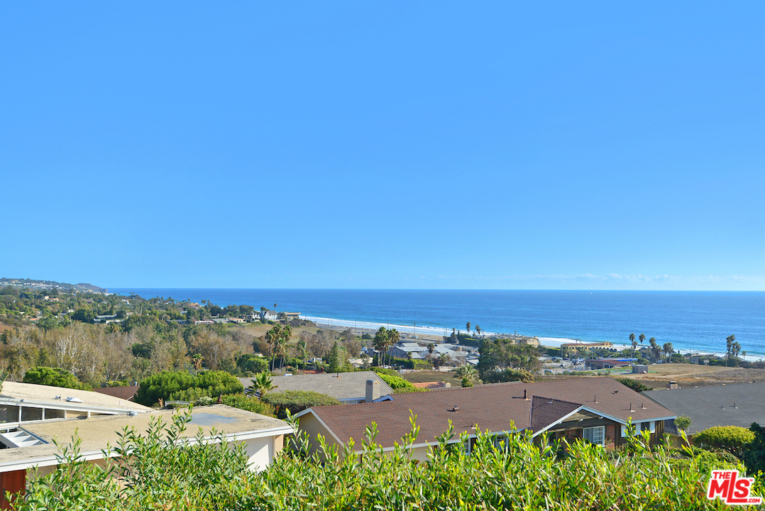 6249 Tapia Drive Malibu, CA 90265 - Photo 18 of 21 an aerial view of a city and mountain view in back