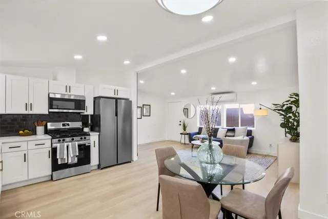 a living room with furniture or couch and a flat screen tv