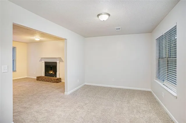 a view of a livingroom with a fireplace