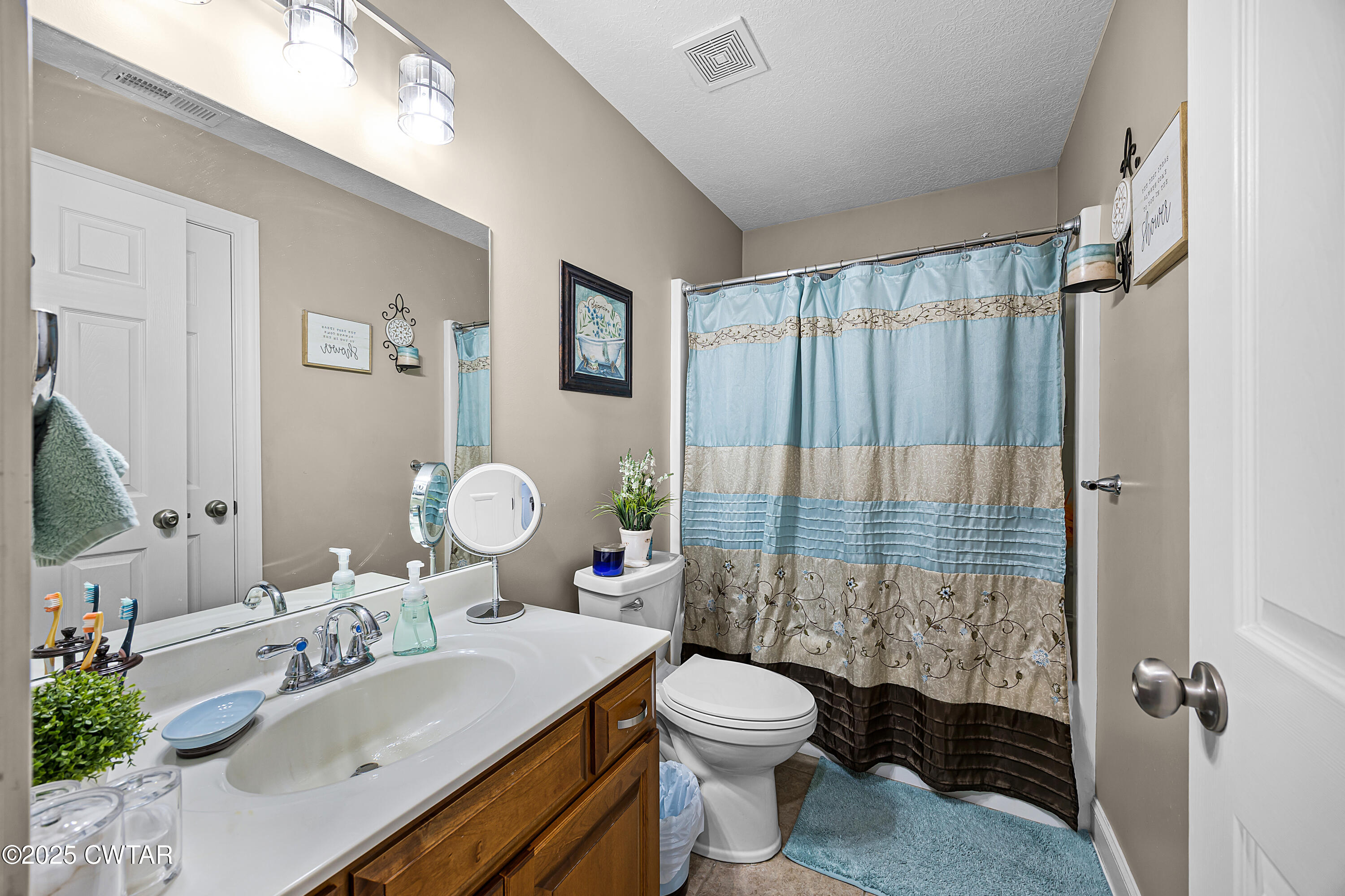 18232 Highway 79 Gadsden, TN 38337 - Photo 11 of 22 a bathroom with a toilet sink and mirror