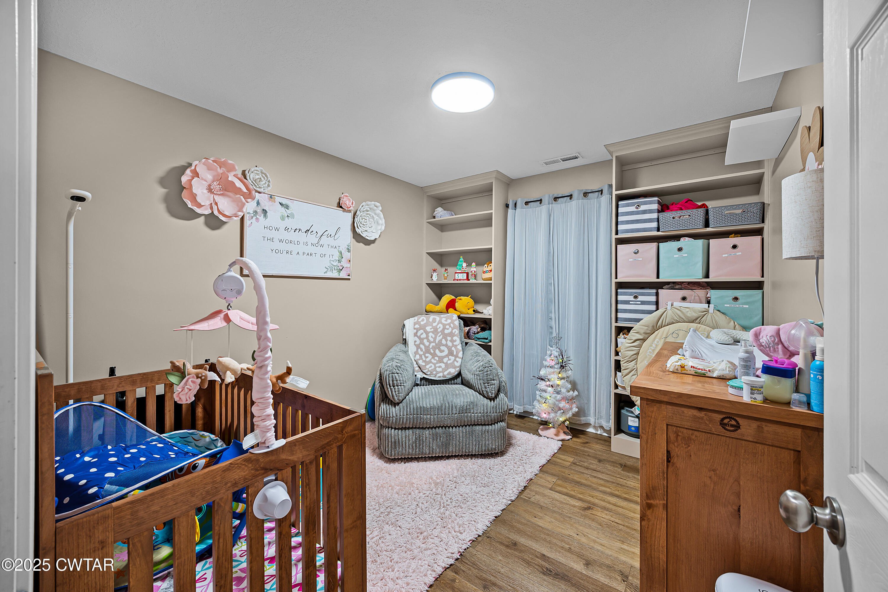 18232 Highway 79 Gadsden, TN 38337 - Photo 14 of 22 a bedroom with furniture and baby crib