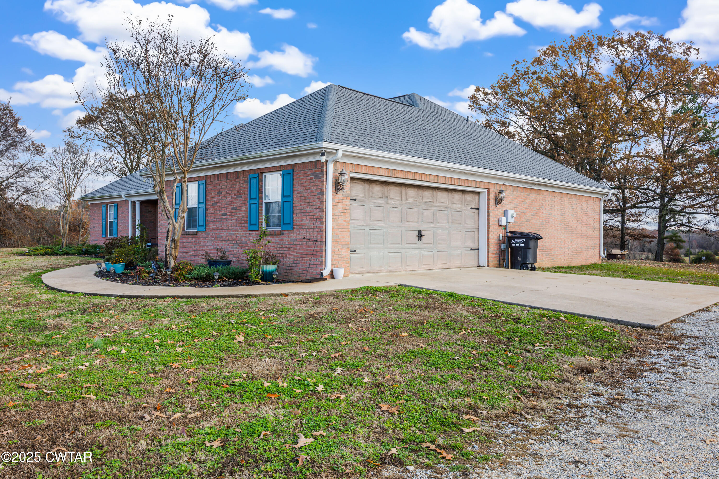 18232 Highway 79 Gadsden, TN 38337 - Photo 16 of 22 a front view of house with yard and trees around